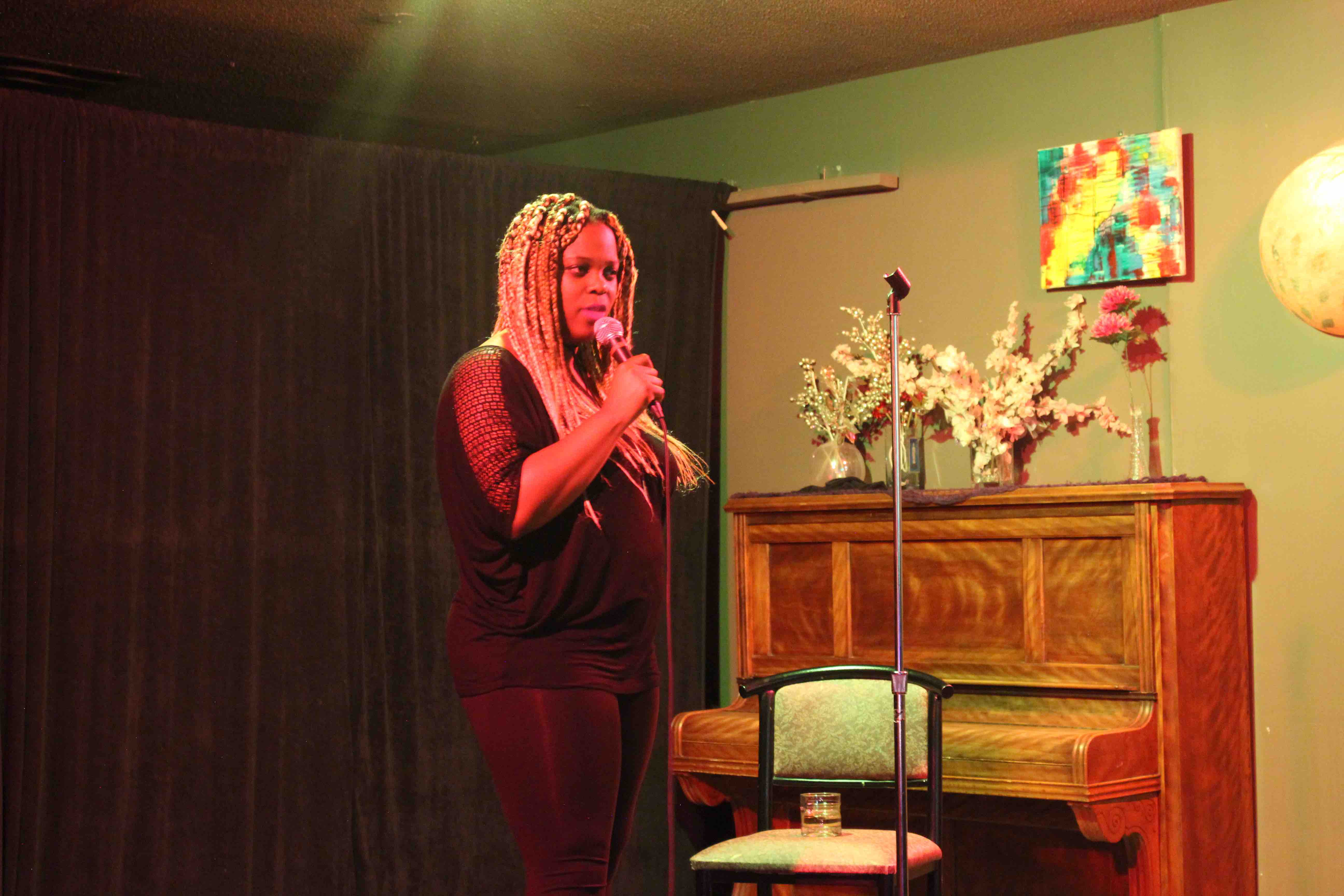 Tamara Shevon performing stand up comedy.